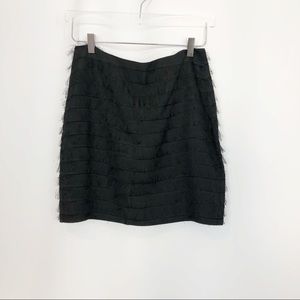 Kenneth Cole Black A line Skirt eyelash treatment